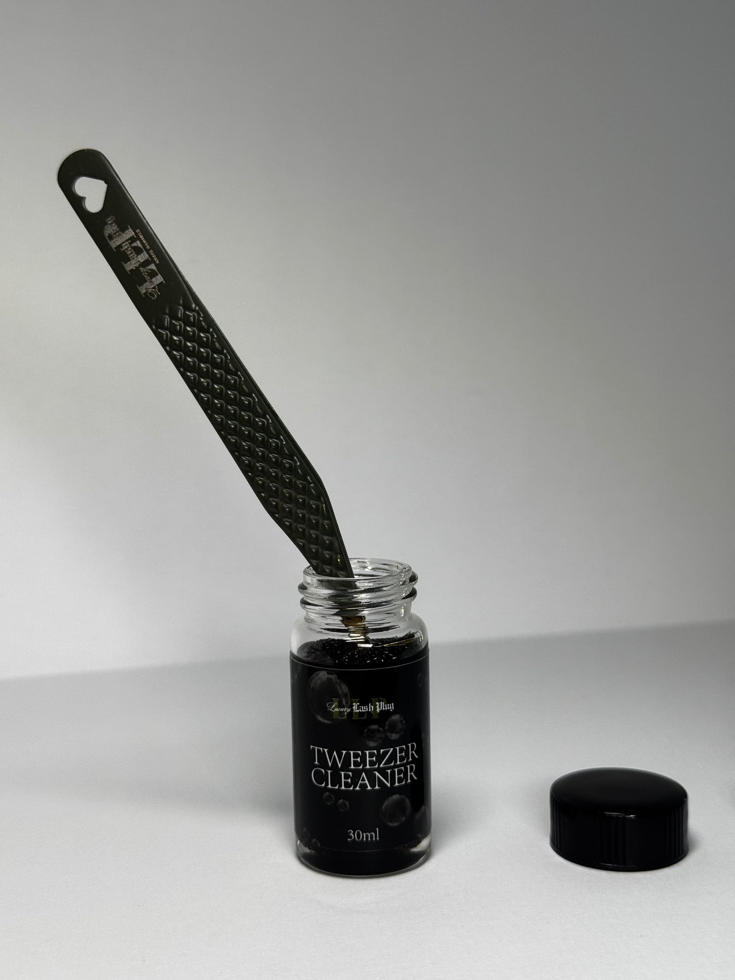 Tweezer cleaner